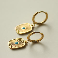 Defender Dangle Earrings