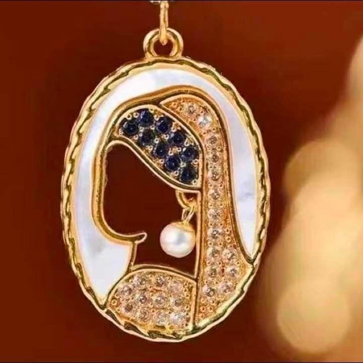 The Girl With A Pearl Necklace - Local Pitara
